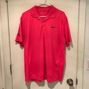 Bright pink Nike Dri-fit golf shirt